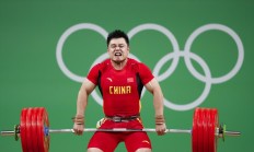 IM体育:男子举重全锦赛收官 全运会“四冠王”杨哲夺两金